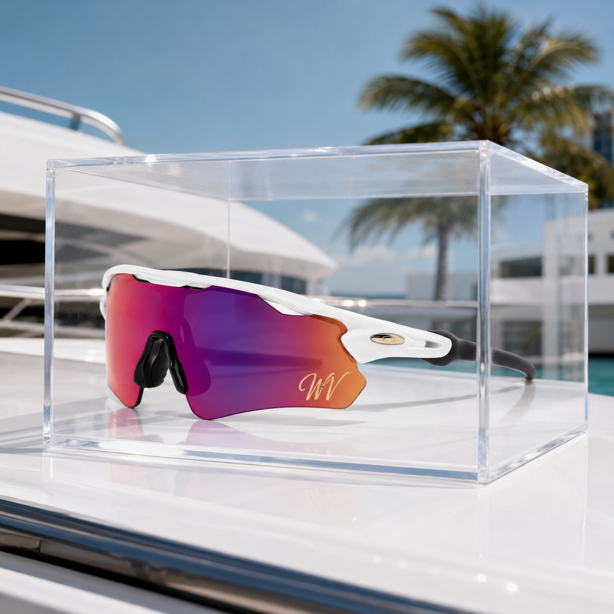 Woah Vyzrz in a clear display case on a yacht deck